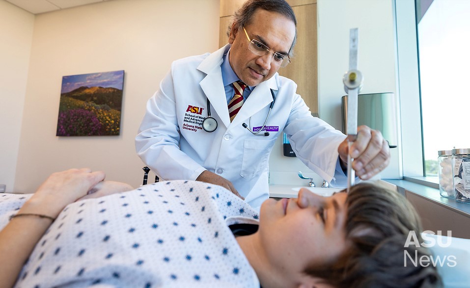 A doctor examining a patient