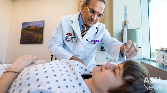 A doctor examining a patient