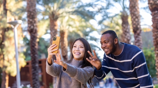 Two ASU students posing for a selfie